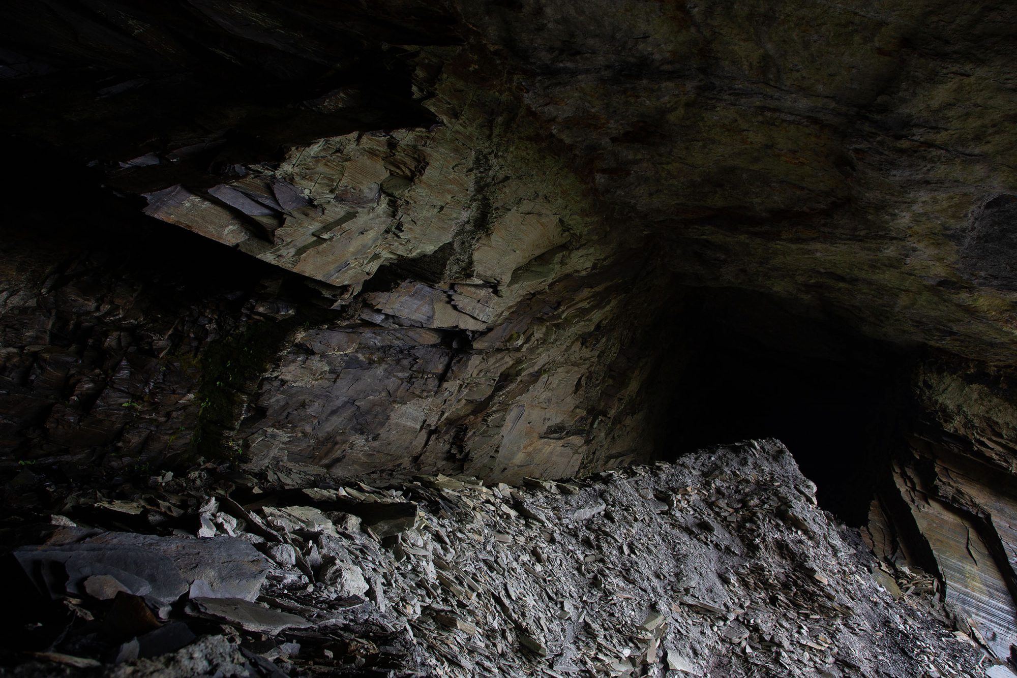 dark cave inside a slate quarry.